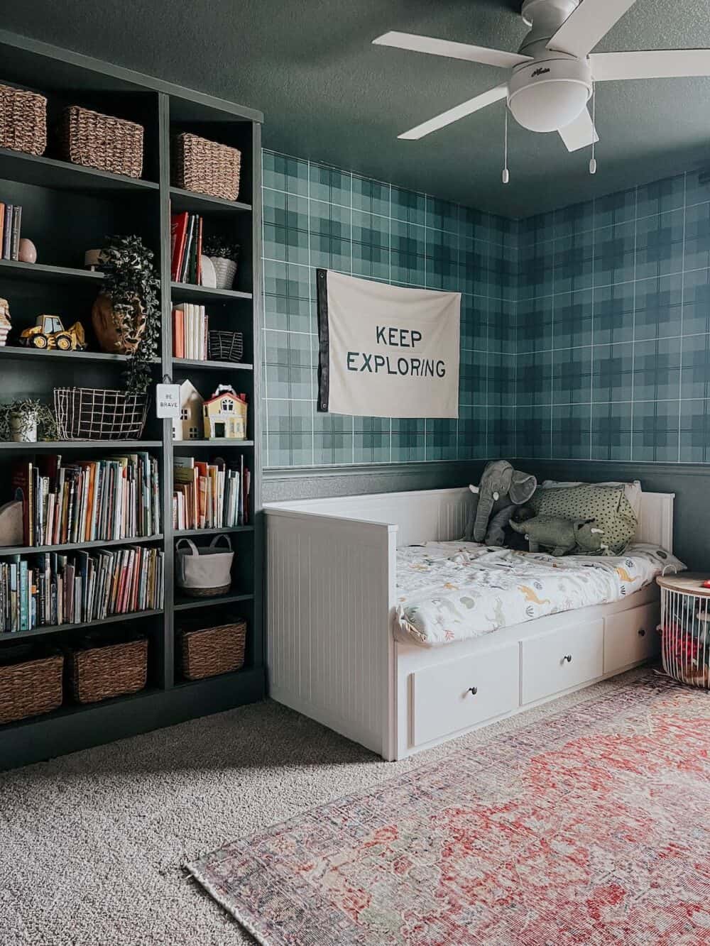 boys' bedroom with green plaid wallpaper 