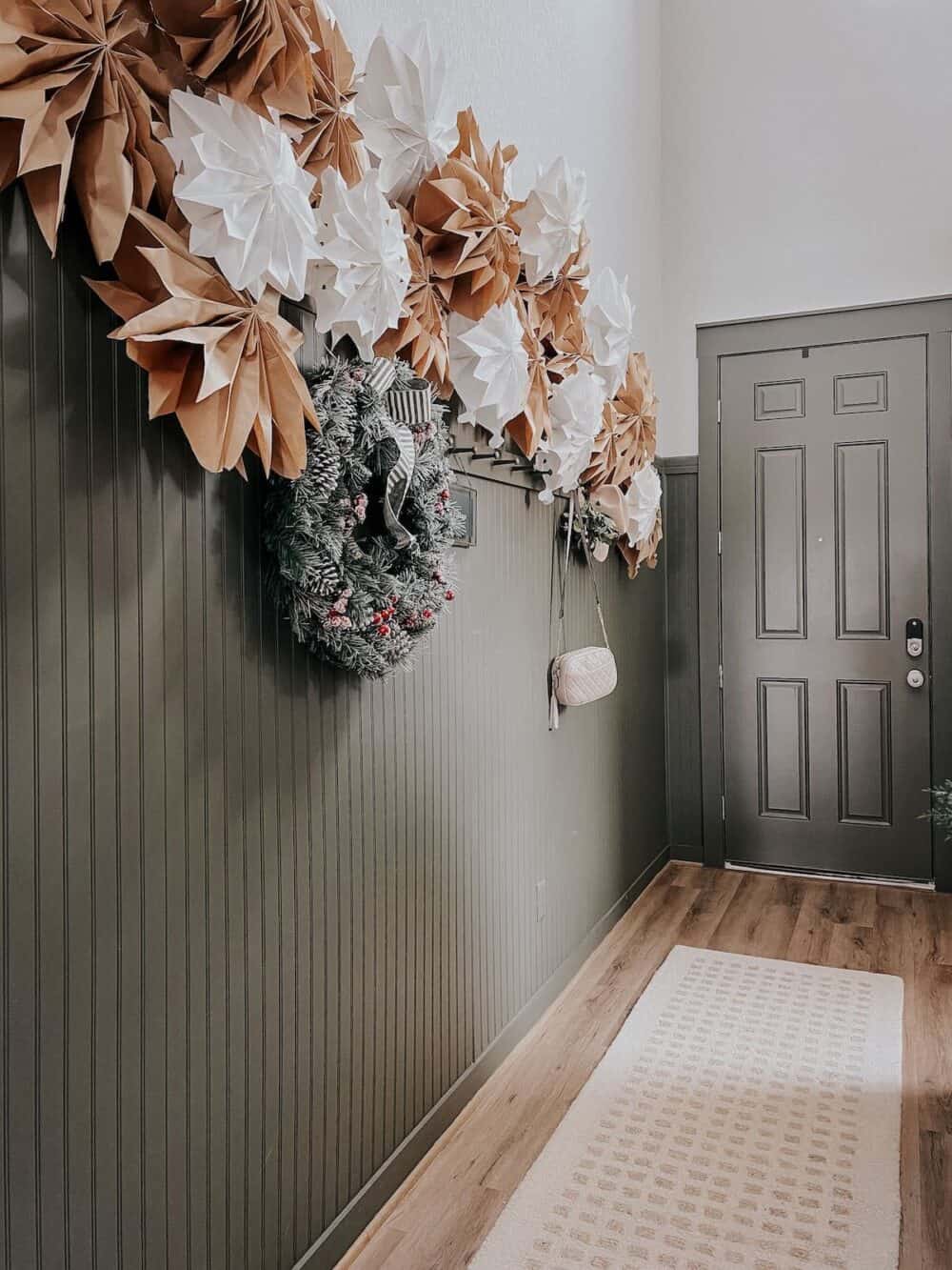 entry with paper star garland for Christmas 