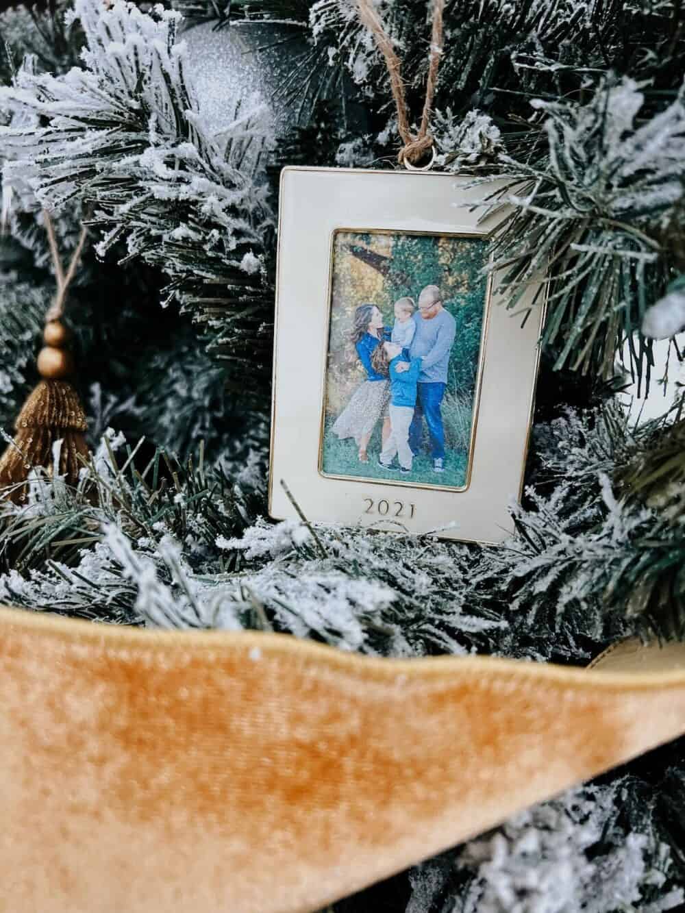 close up of a family photo ornament 