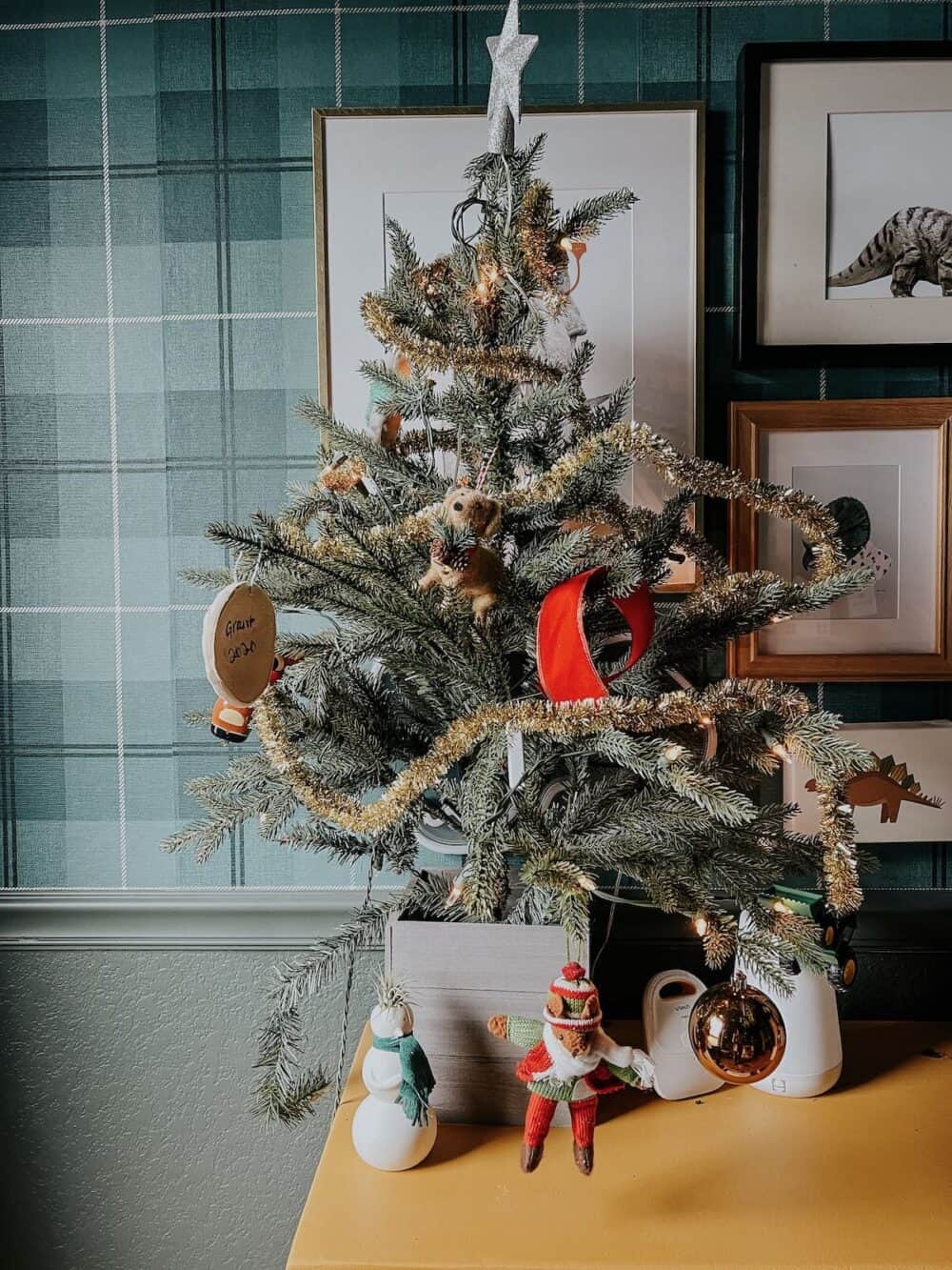 A small tabletop tree in a kid's bedroom
