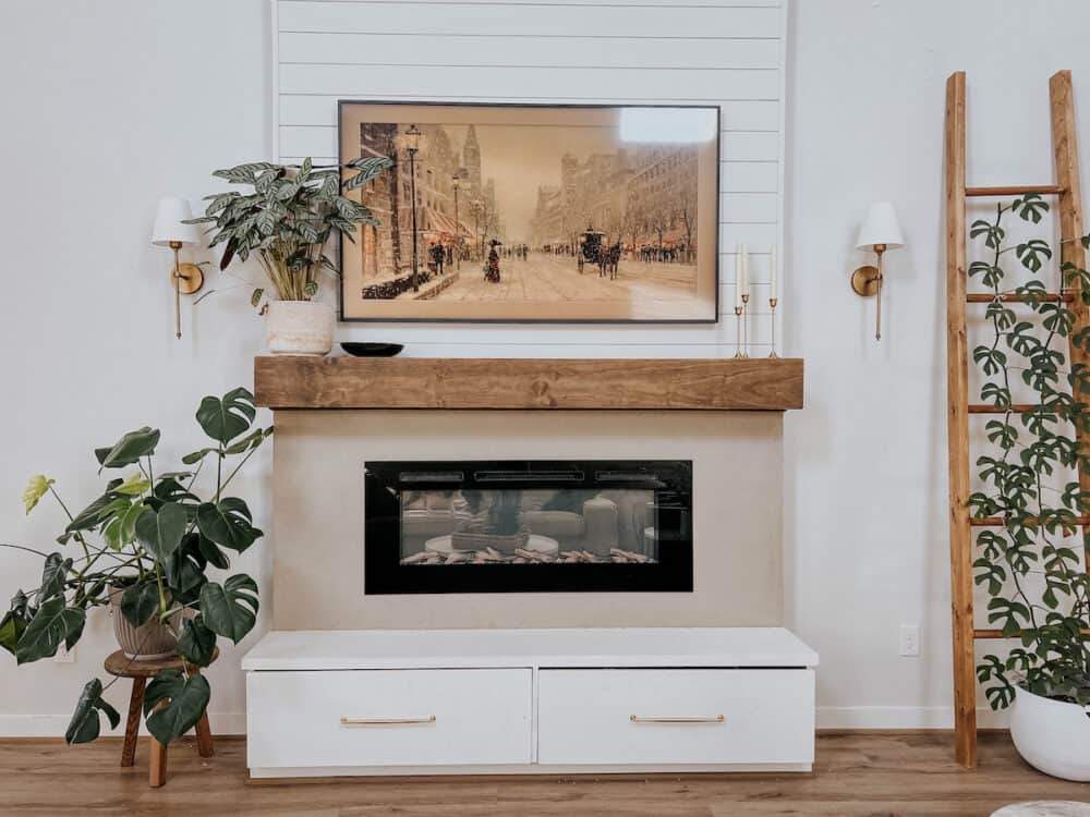 Electric fireplace with wall sconces