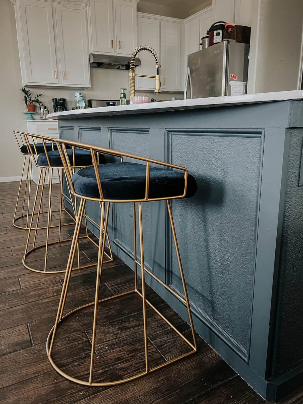 kitchen island with trim on the drywall 