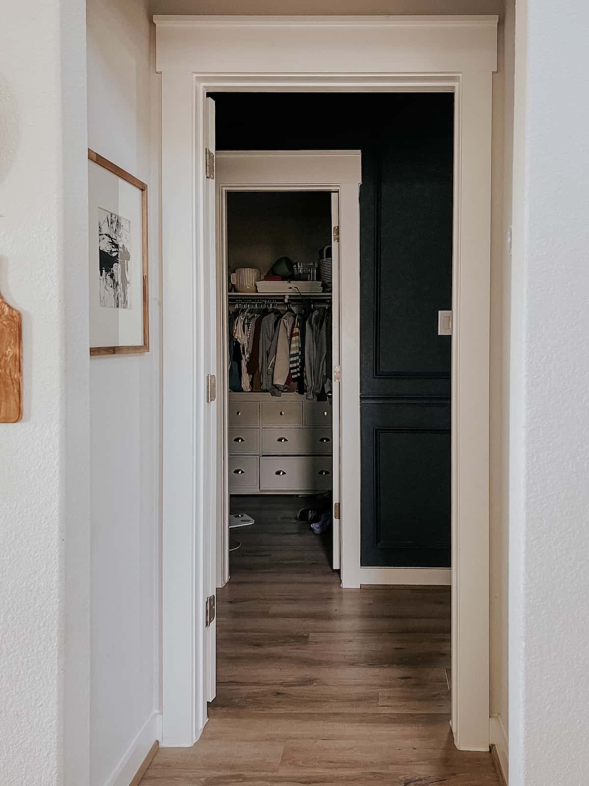 view of a messy closet from a hallway 