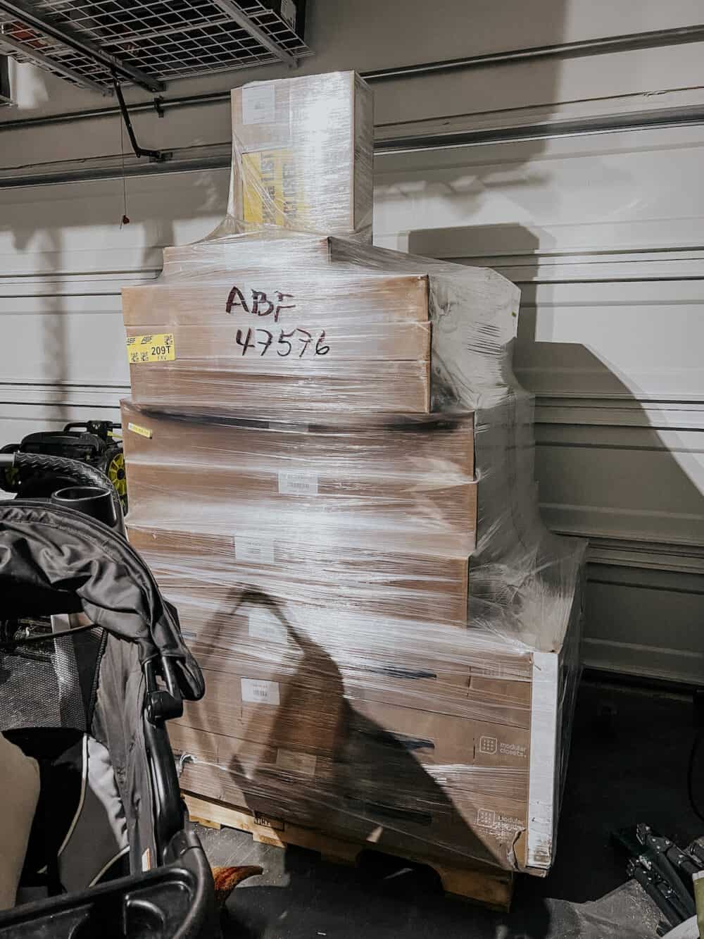 large stack of boxes in a garage 