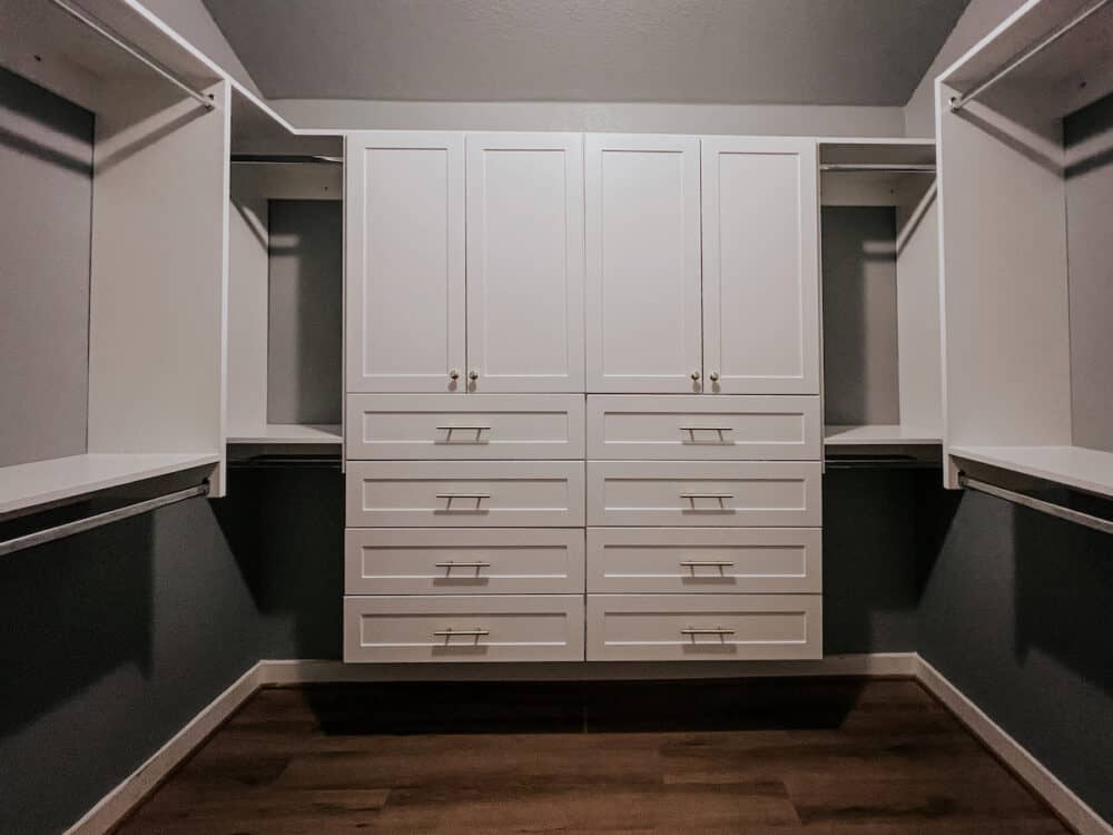 Empty closet with shelving unit 