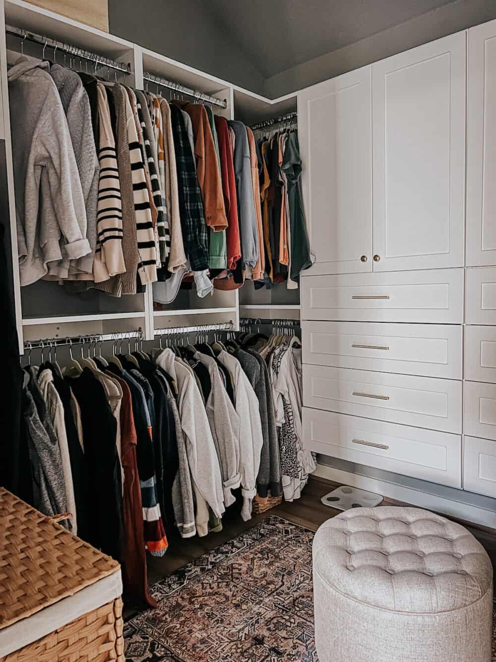 organized walk in closet with built ins 