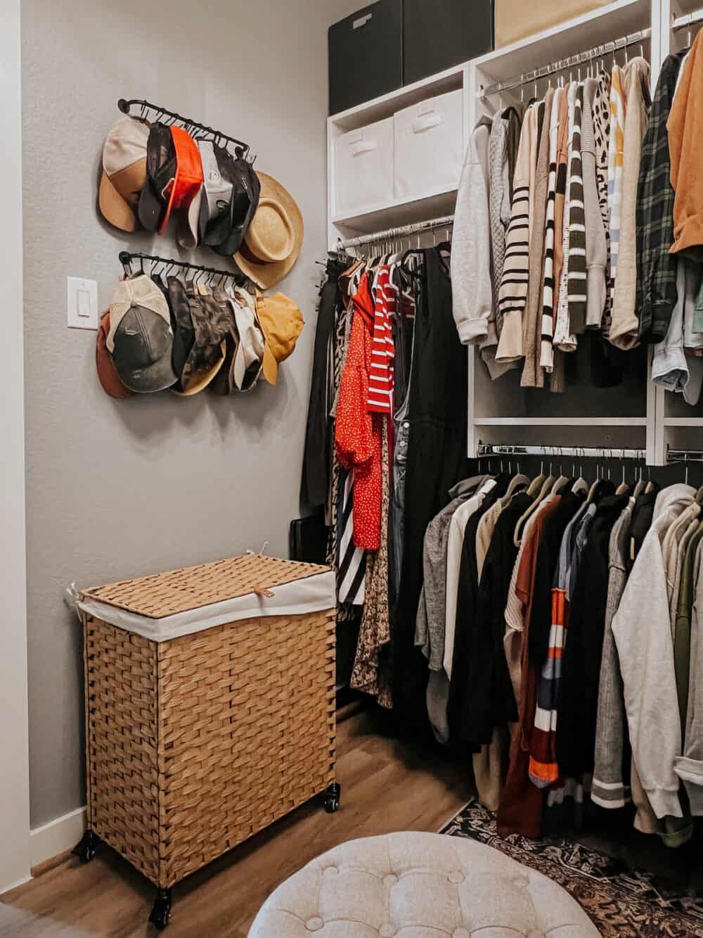 closet with a rattan laundry basket 