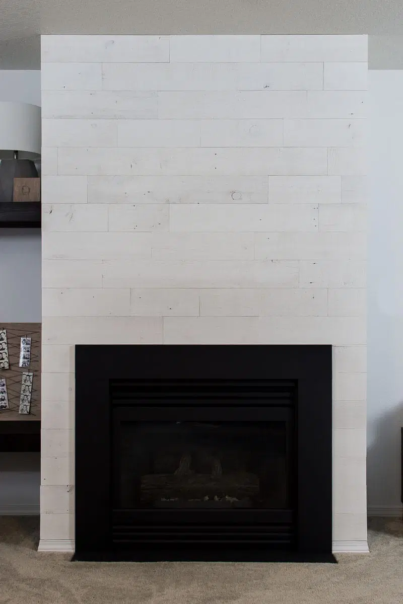 shiplap fireplace with stikwood panels 