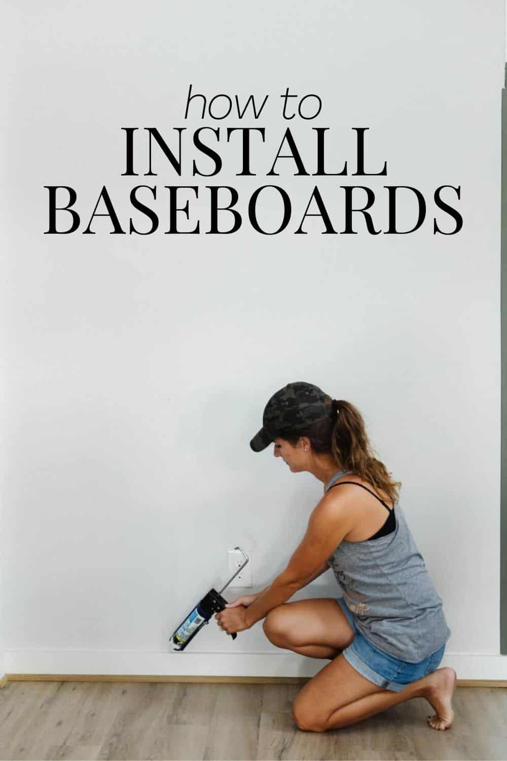 woman caulking a baseboard with text overlay - how to install baseboards 