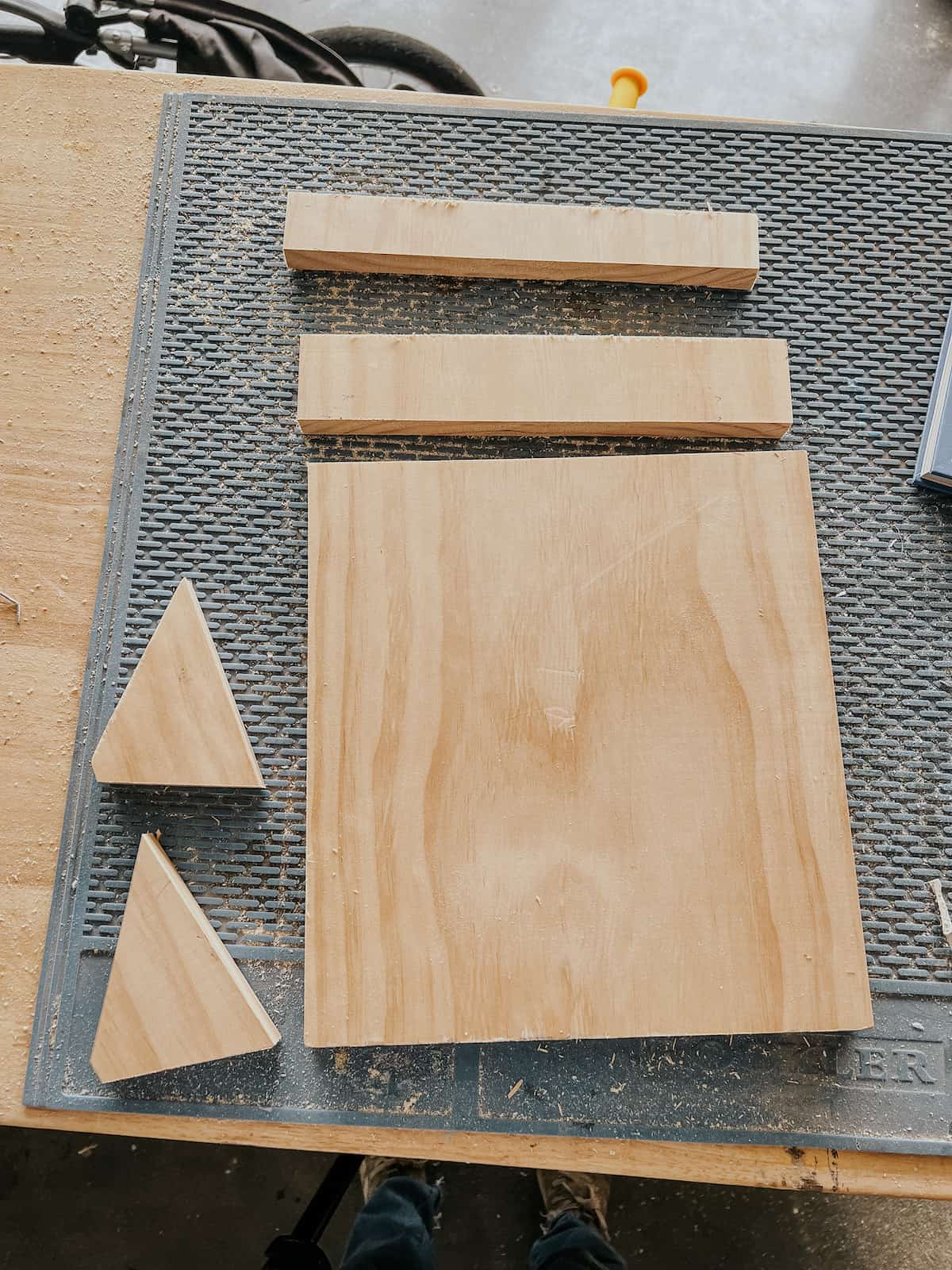 pieces of pine cut for DIY cookbook stand