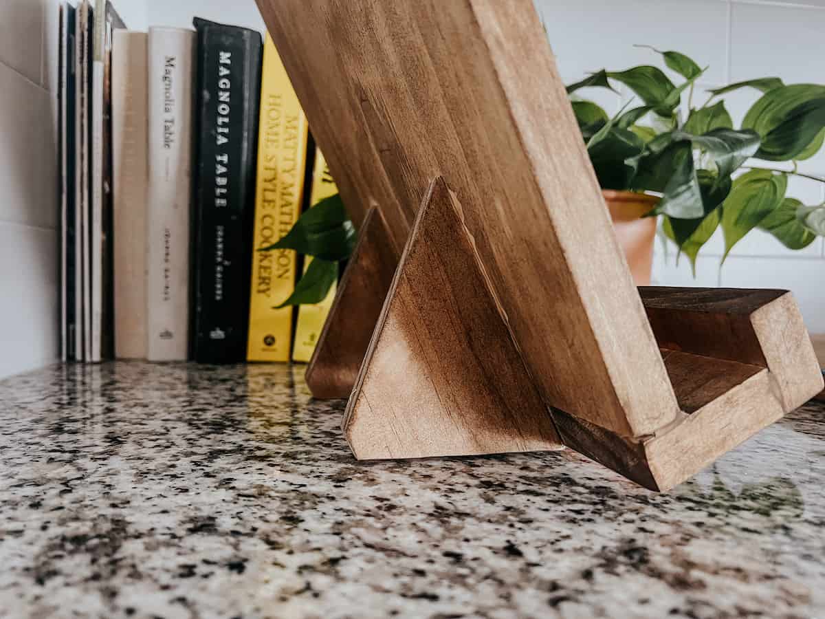 close up view of legs of cookbook holder