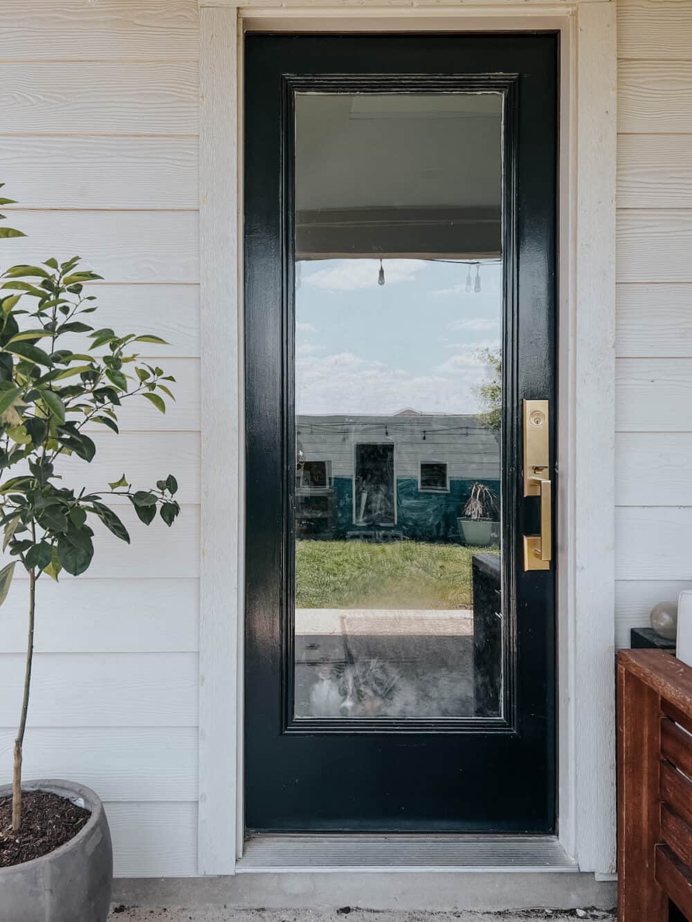 back door painted with Sherwin Williams Tricorn Black