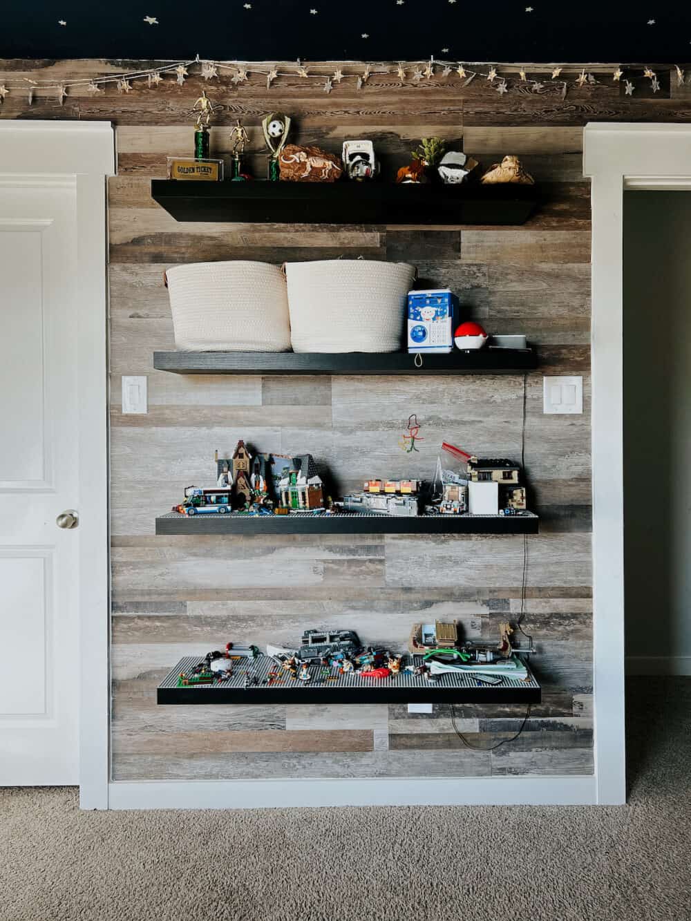 Kids room with floating shelves 