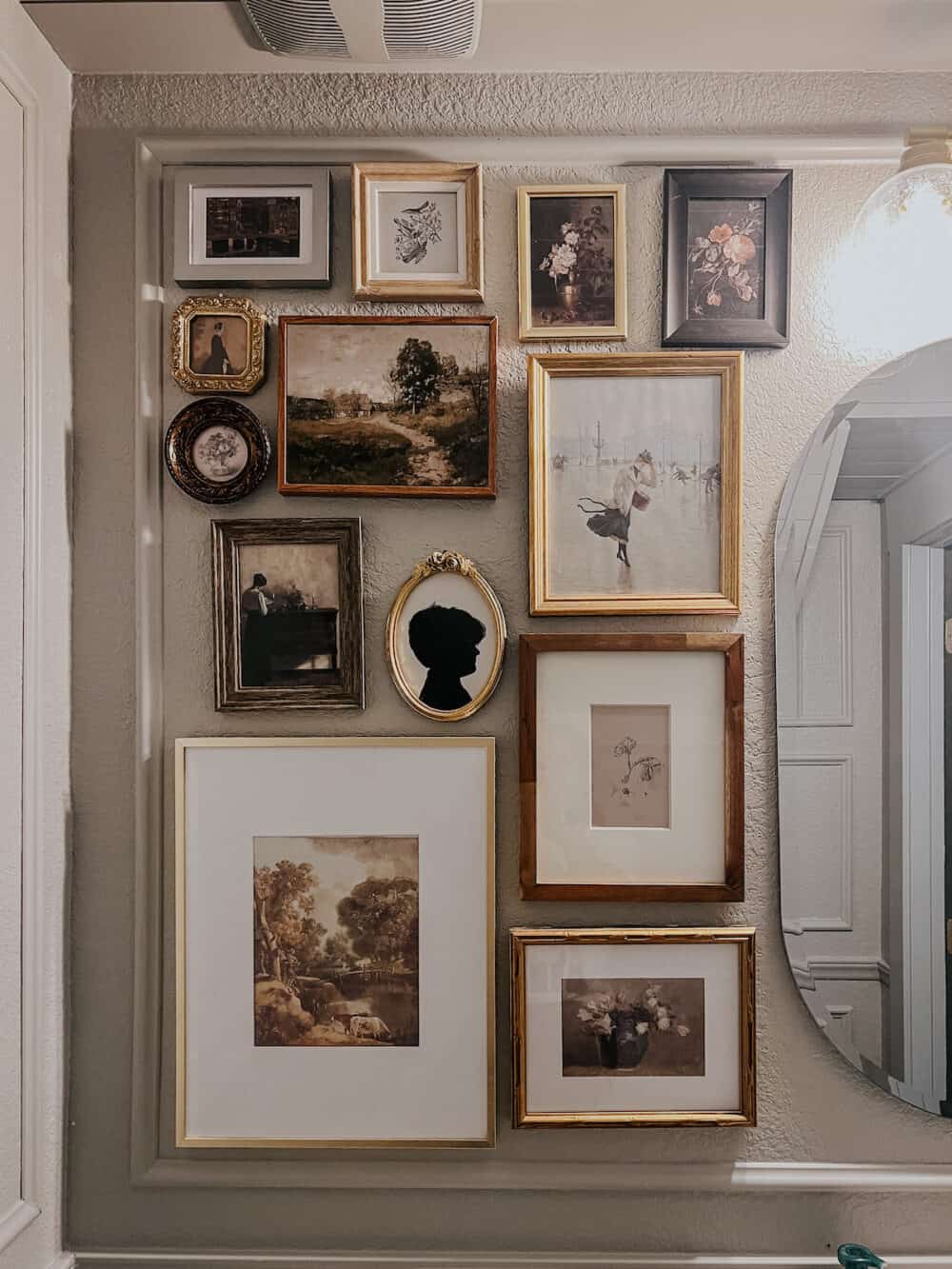gallery wall in small powder room