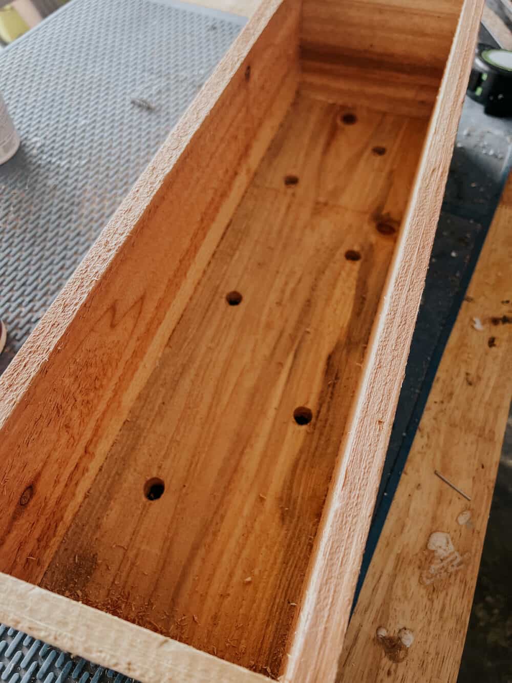 Completed window box with drainage holes drilled in it 