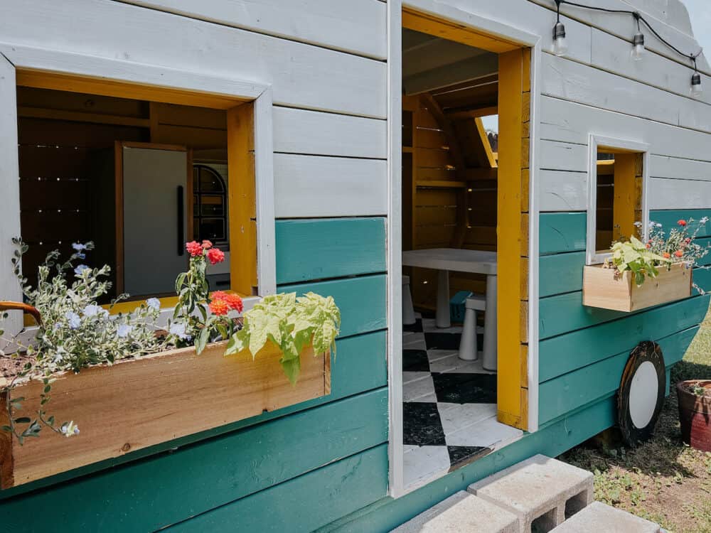 window boxes under the windows of a play camper 