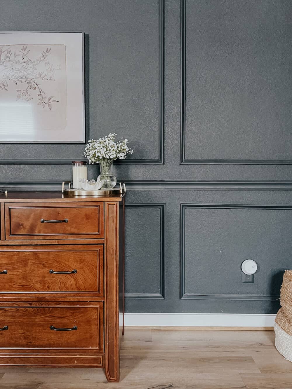 vignette in bedroom with faux baby's breath bouquet
