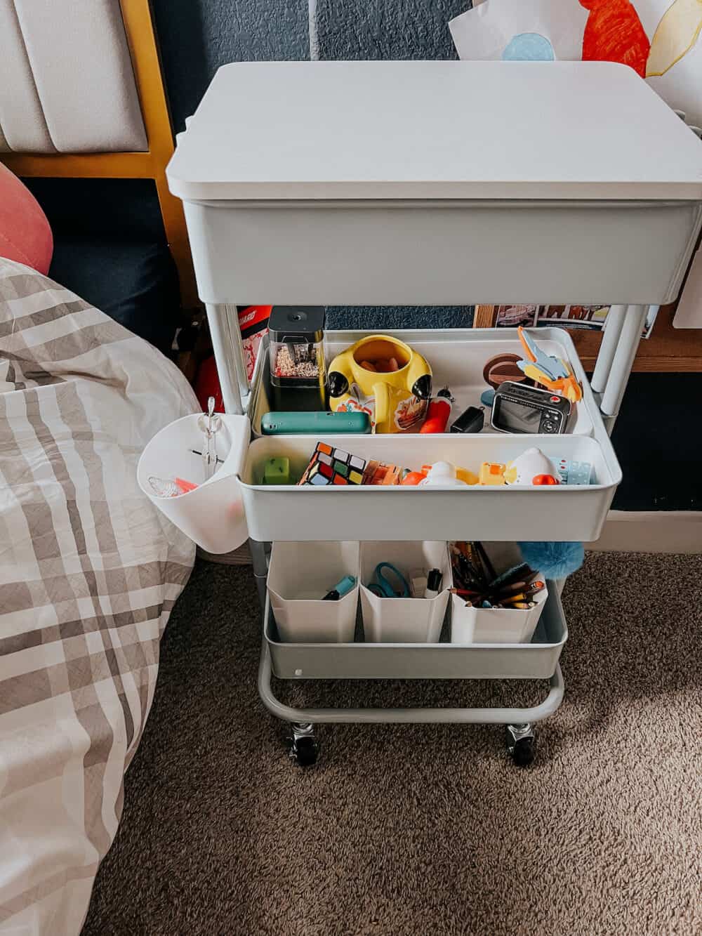 Three tier cart with art supplies 