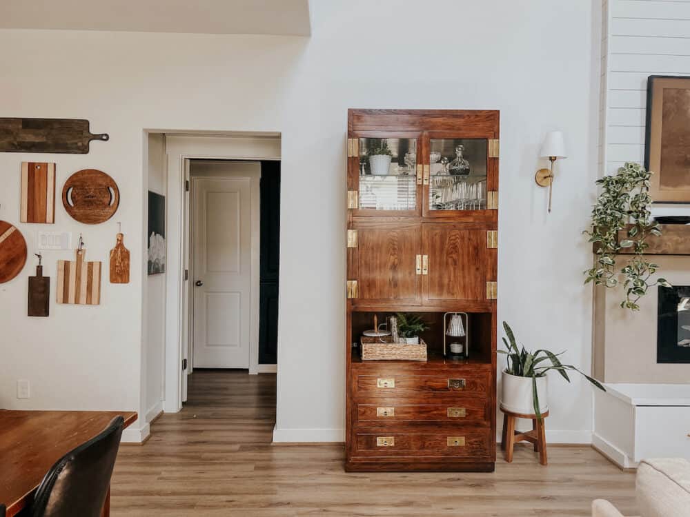 bar cabinet between a living and dining room 