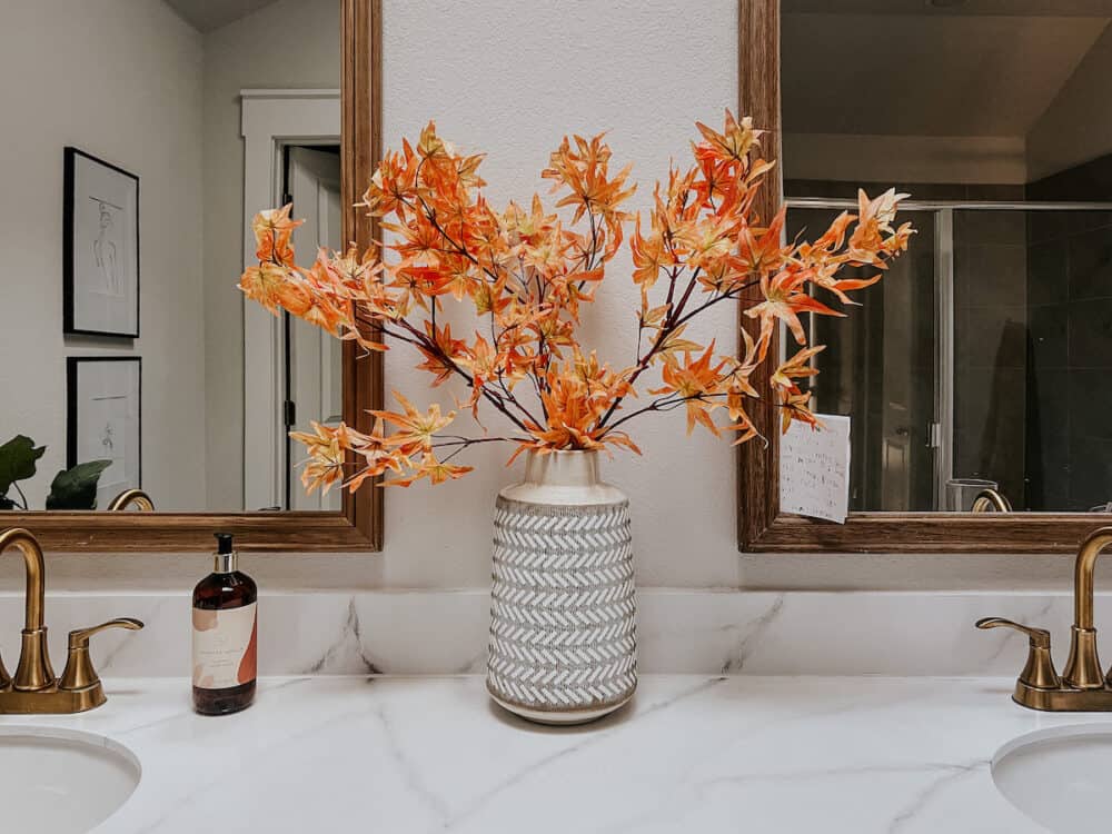 bathroom with faux maple leaves