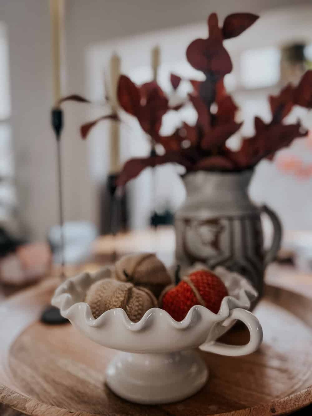 close up of fall vignette on a dining table 