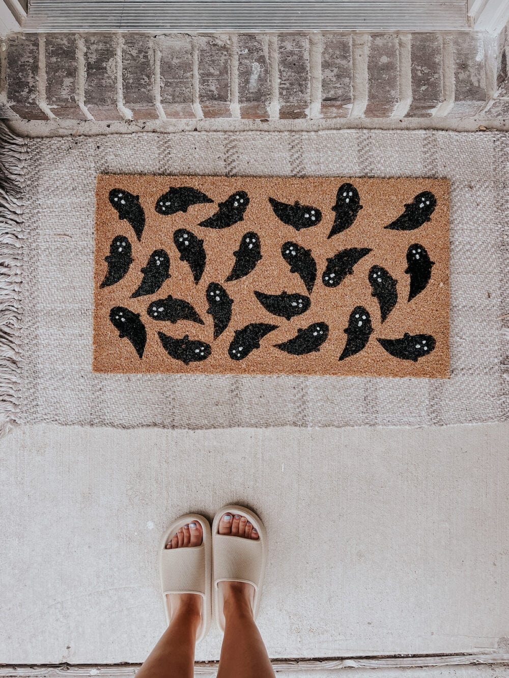 overhead view of a DIY ghost door mat 