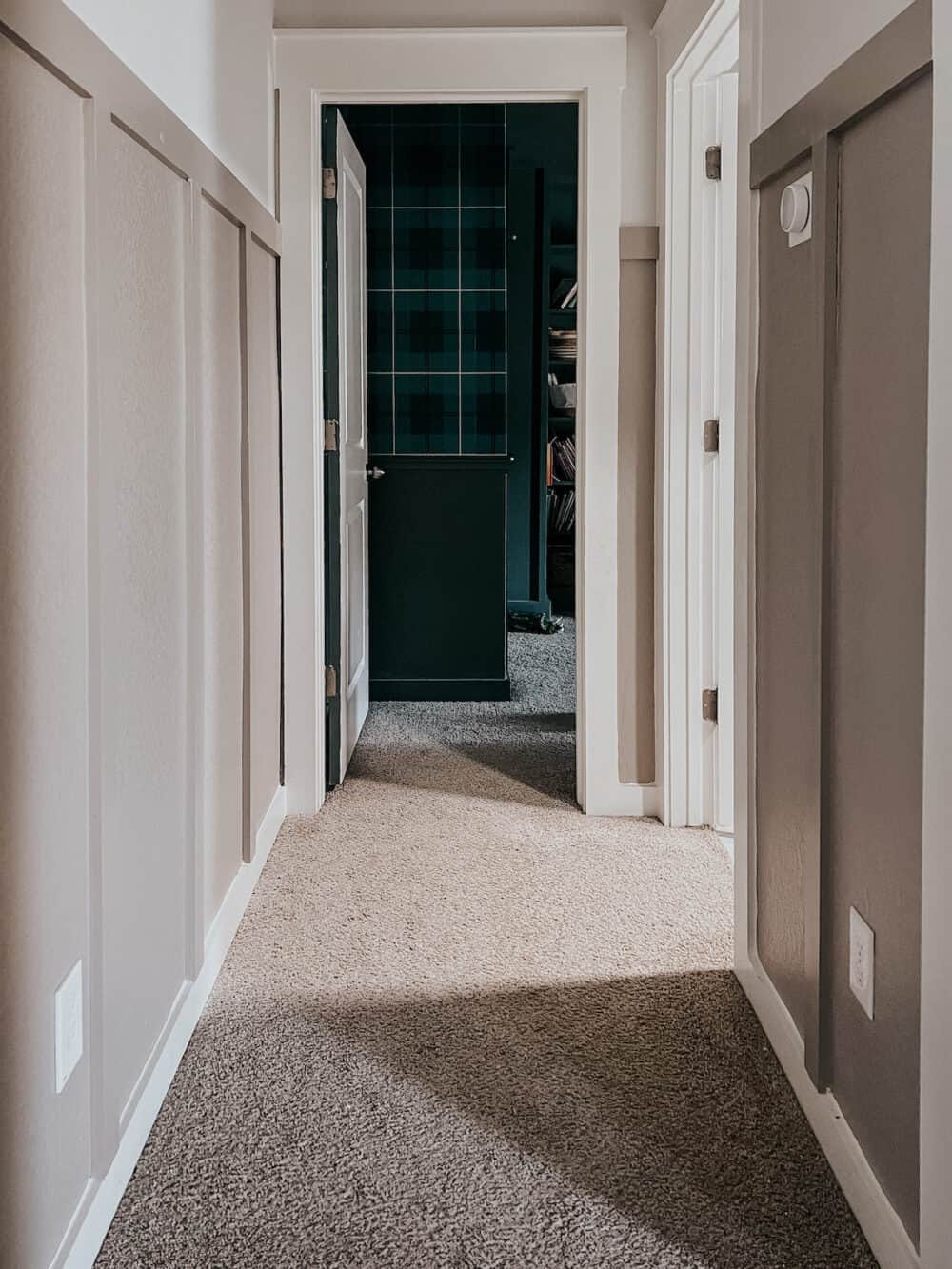 upstairs hallway with greige board and batten 