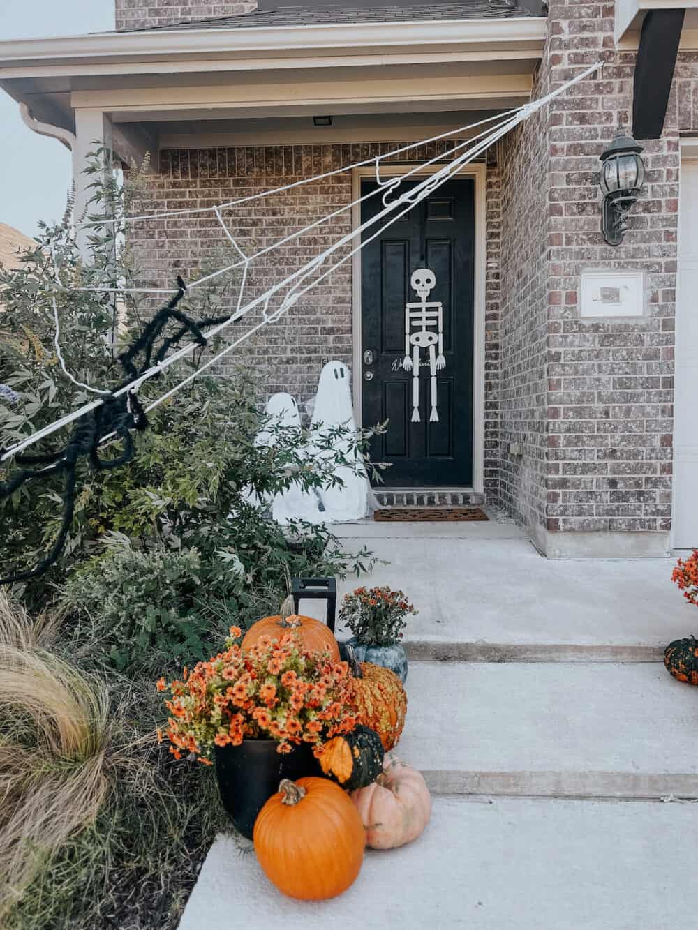 small front porch with decor for halloween 