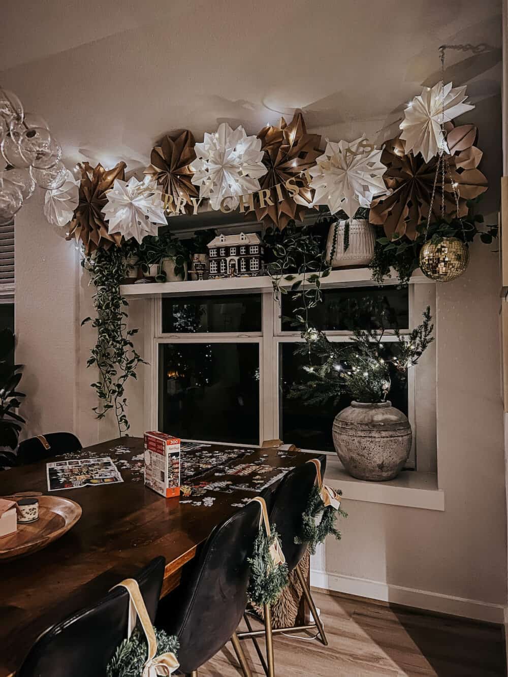 Dining room with paper snowflake garland 