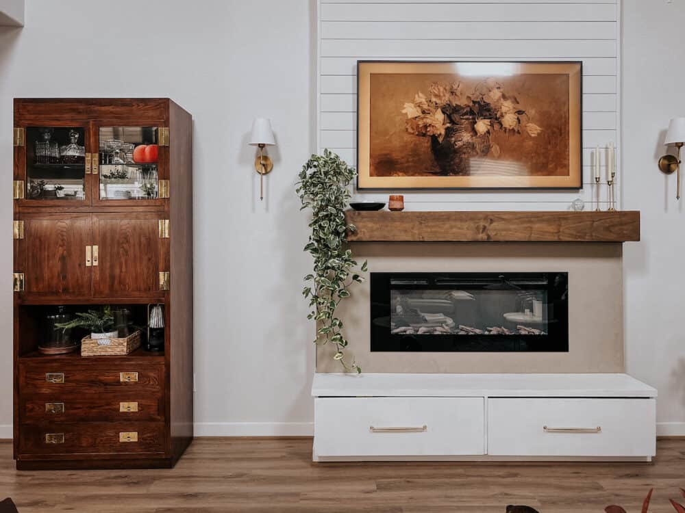 living room with a DIY electric fireplace with shiplap