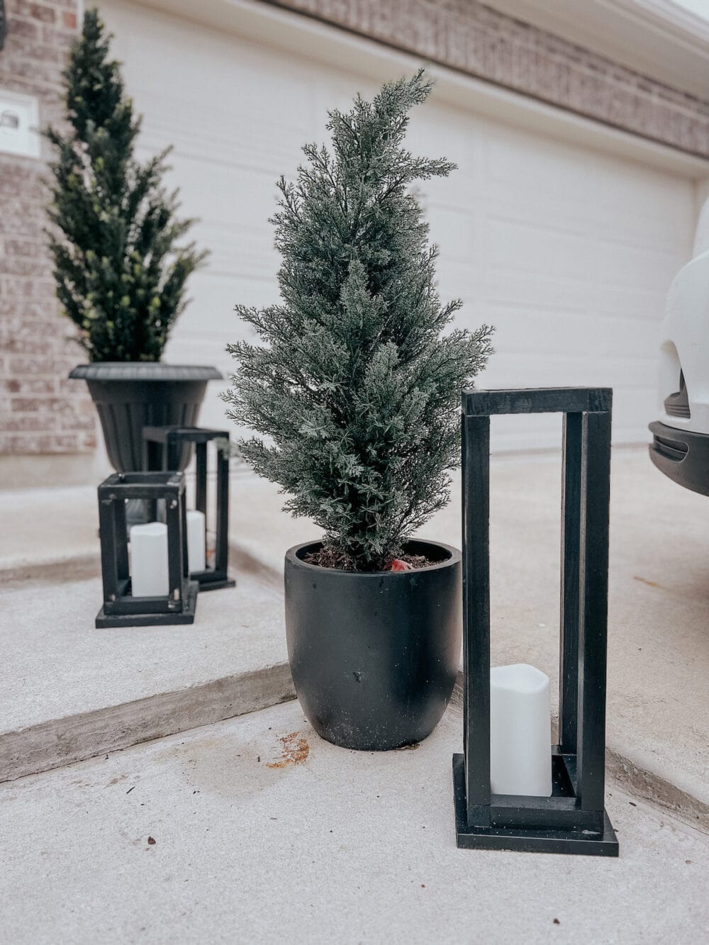 close up of DIY black wooden lanterns 