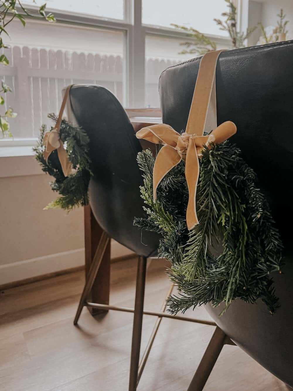 Small wreaths on a chair for the holidays