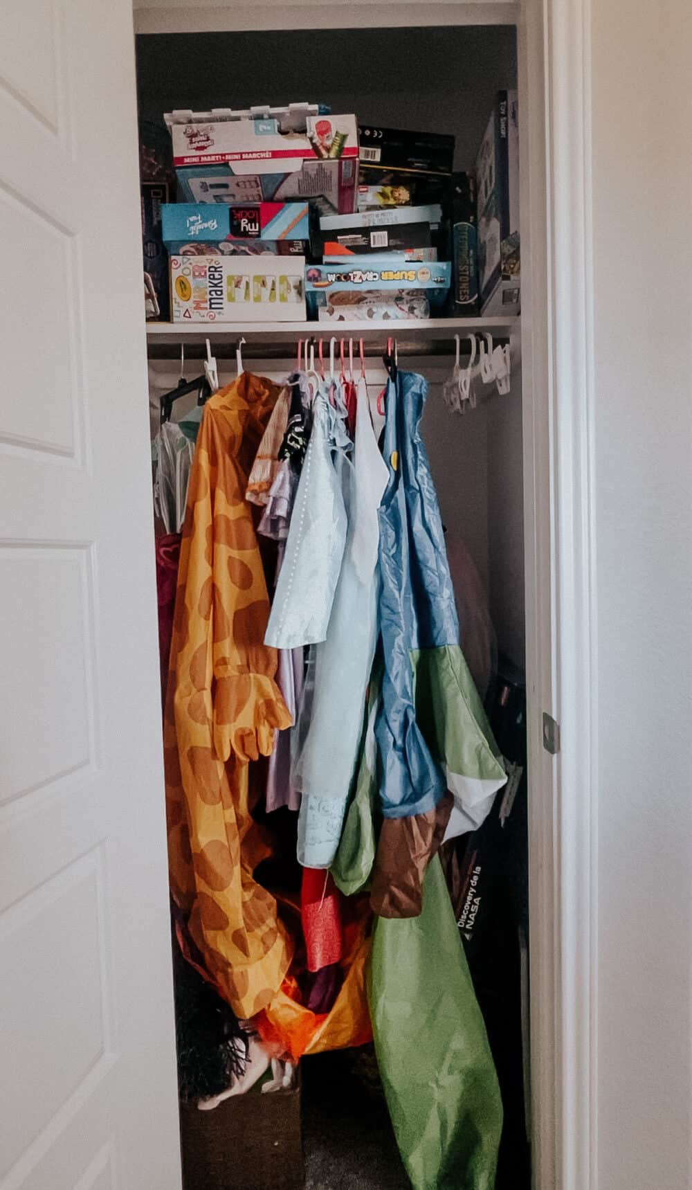 a play room closet before adding organization