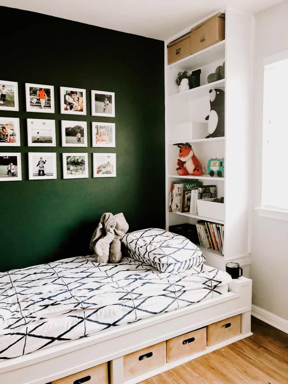 a grid photo wall in a child's room 