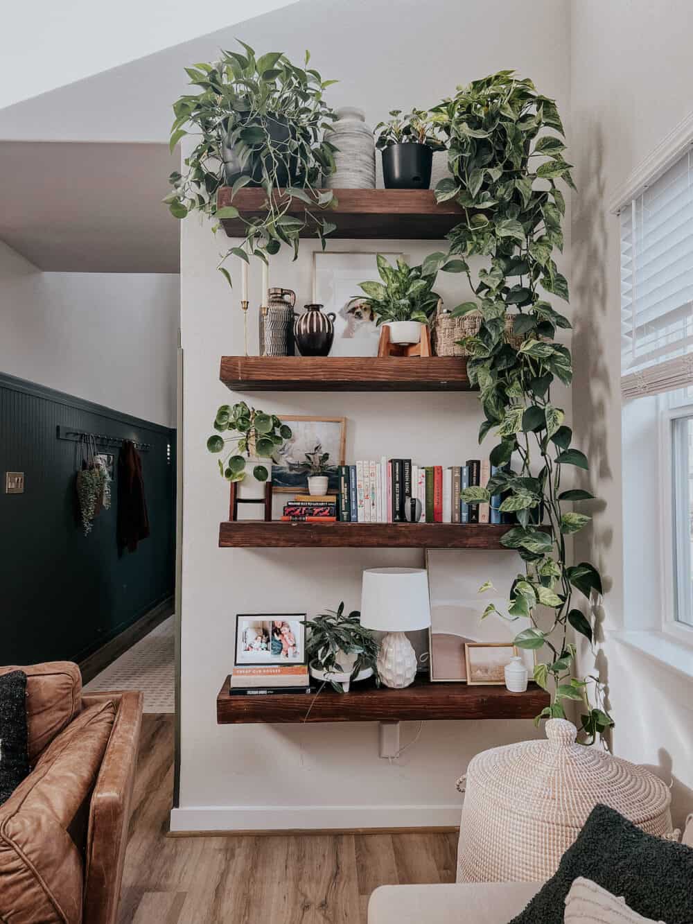 wood floating shelves on a tall wall