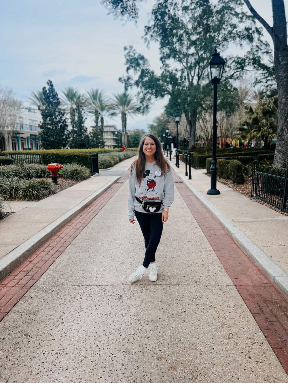 woman posing at Port Orleans French Quarter resort in Disney World 