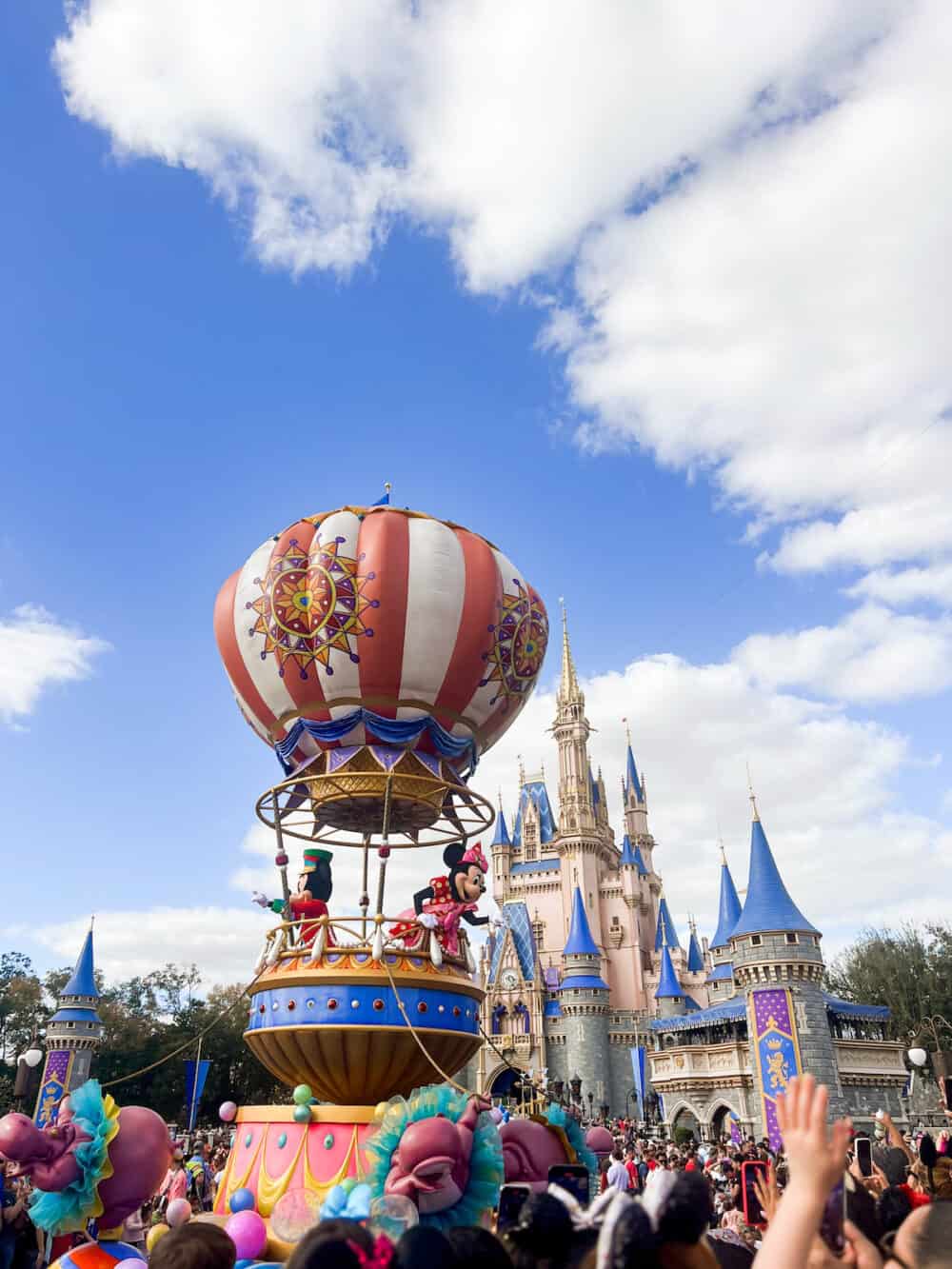 Magic Kingdom Festival of Fantasy parade in front of Cinderella's castle