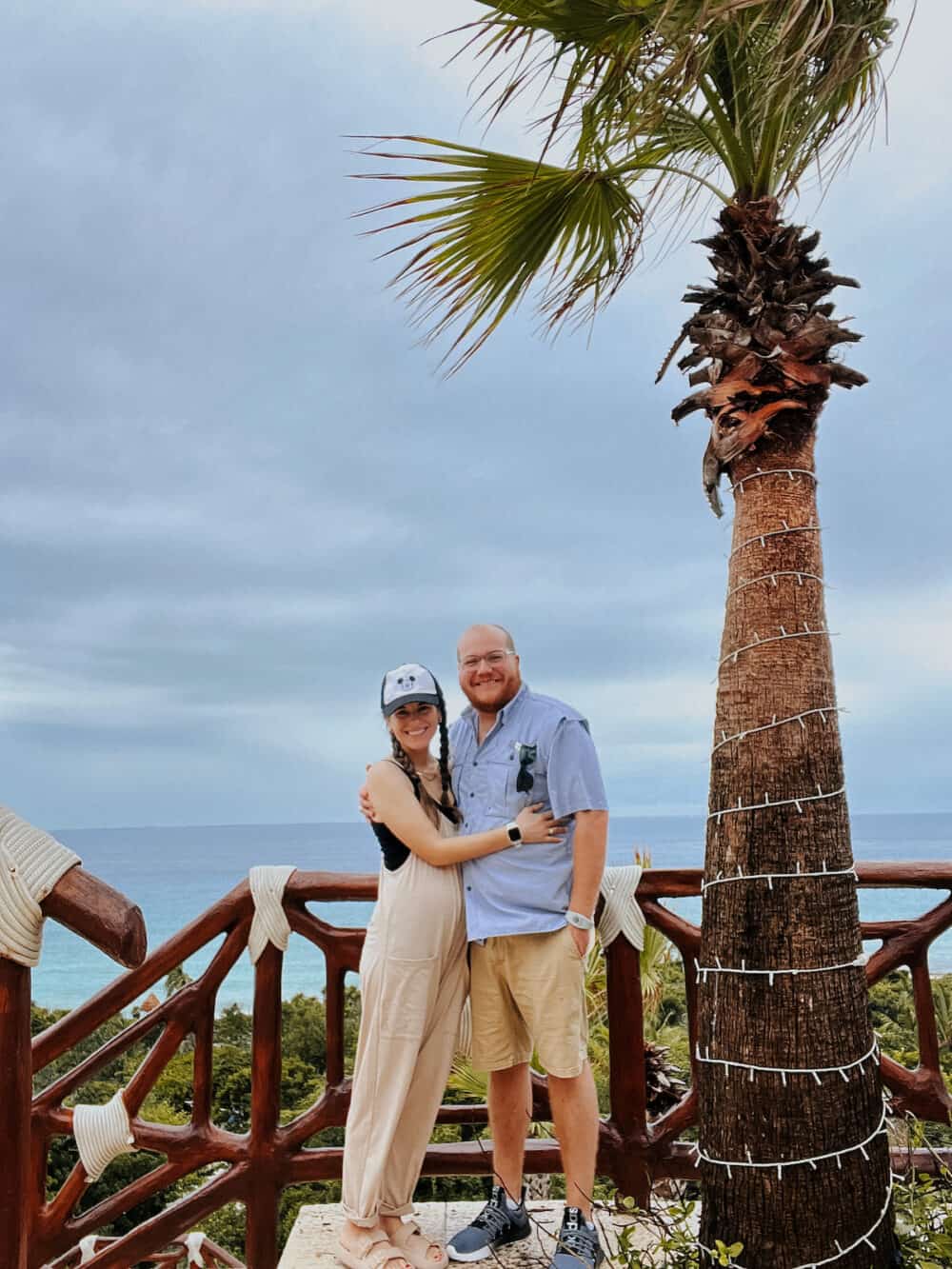 couple embracing near the beach at Hotel XCaret Mexico