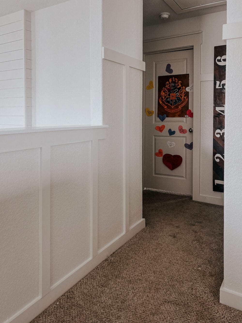 hallway with beige board and batten trim