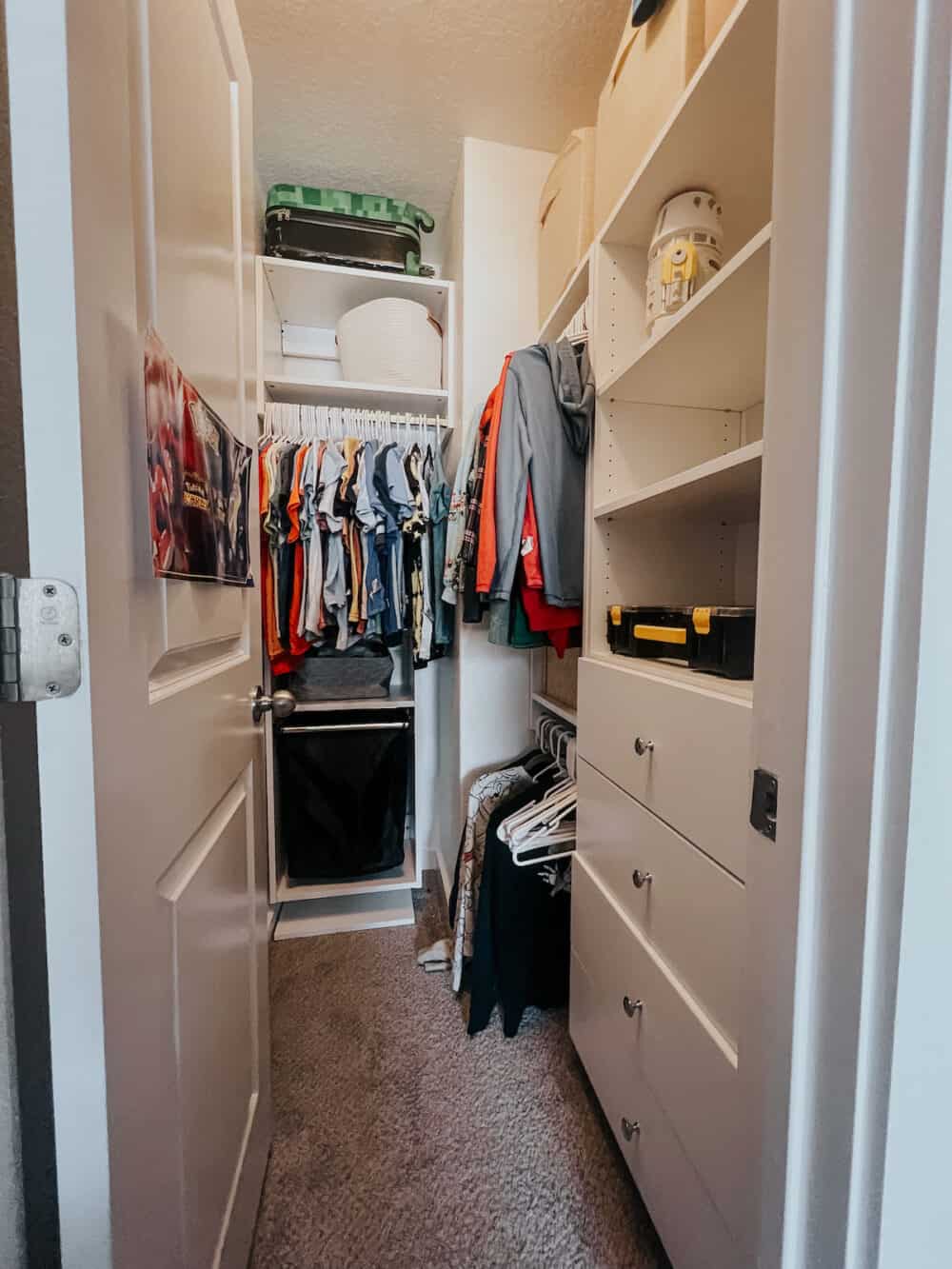 a child's closet with built-in storage