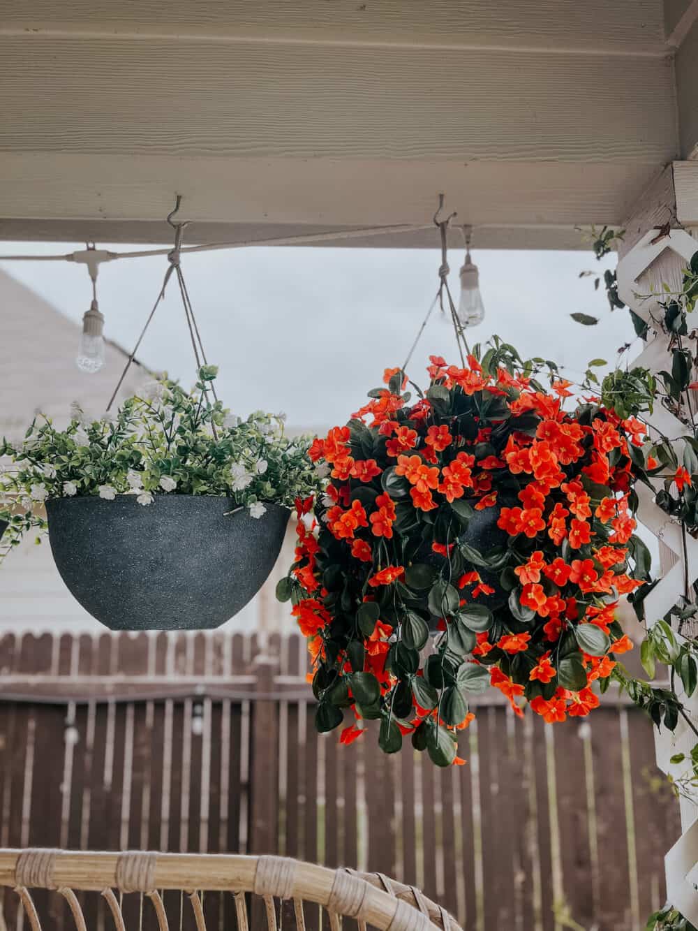 faux hanging plants in an outdoor planter