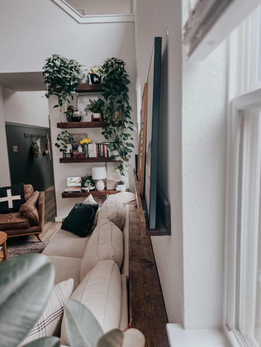 table placed between sofa and wall 