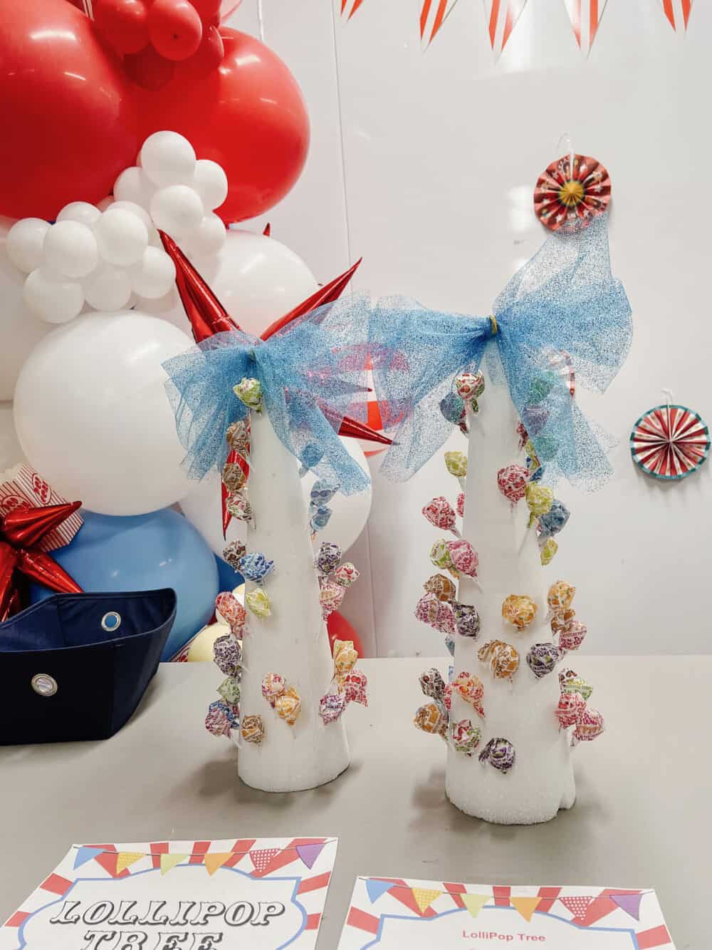 carnival style game with dum dums in styrofoam to win prizes