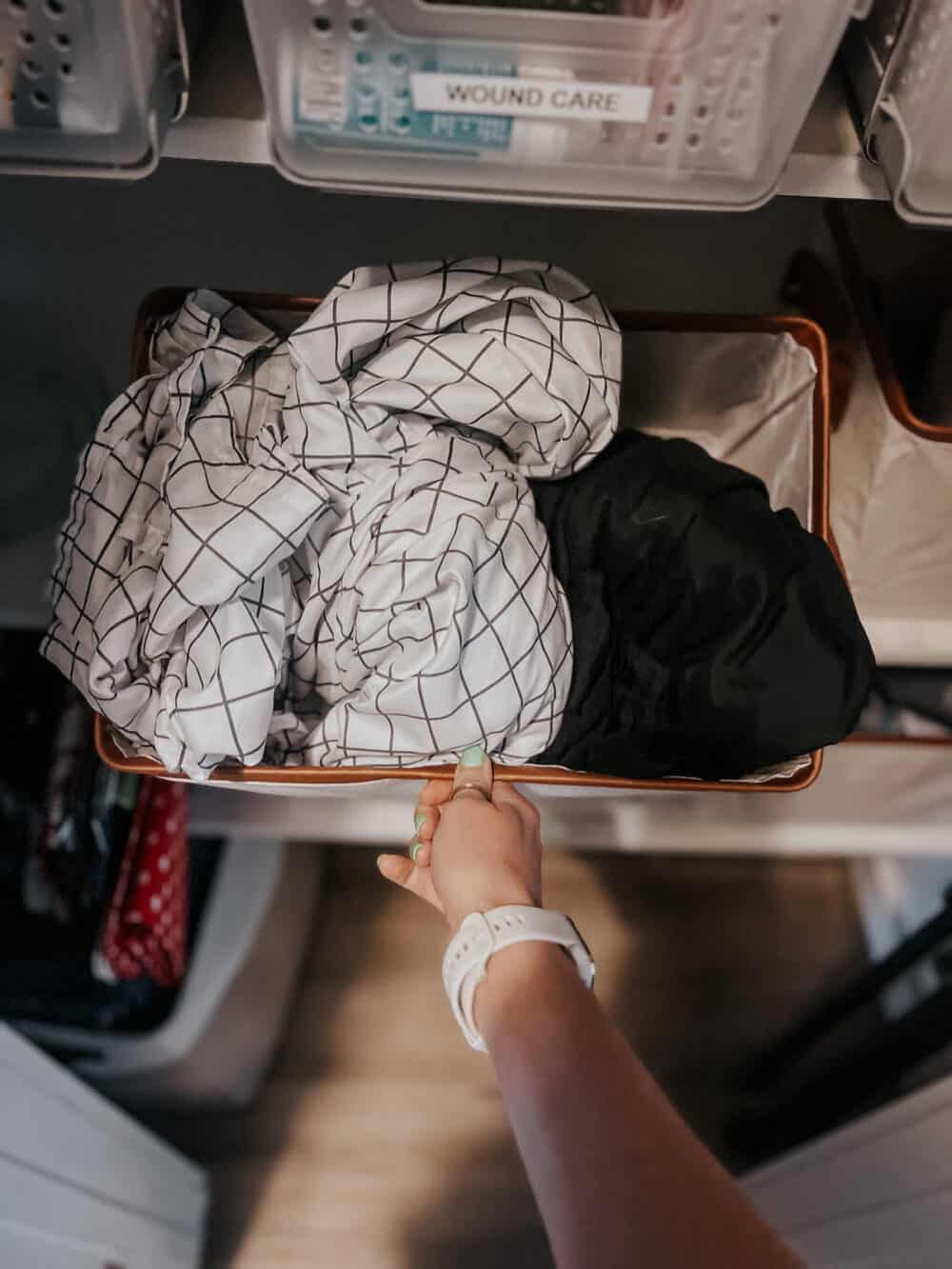 a basket holding extra sheets