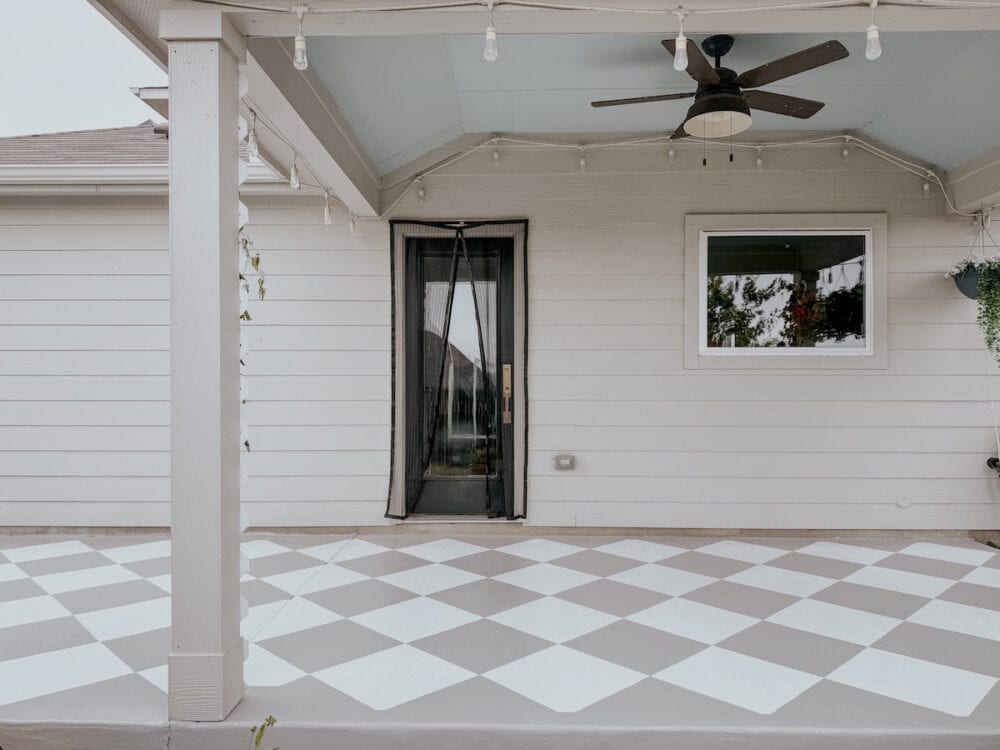 back patio with a painted pattern on the concrete