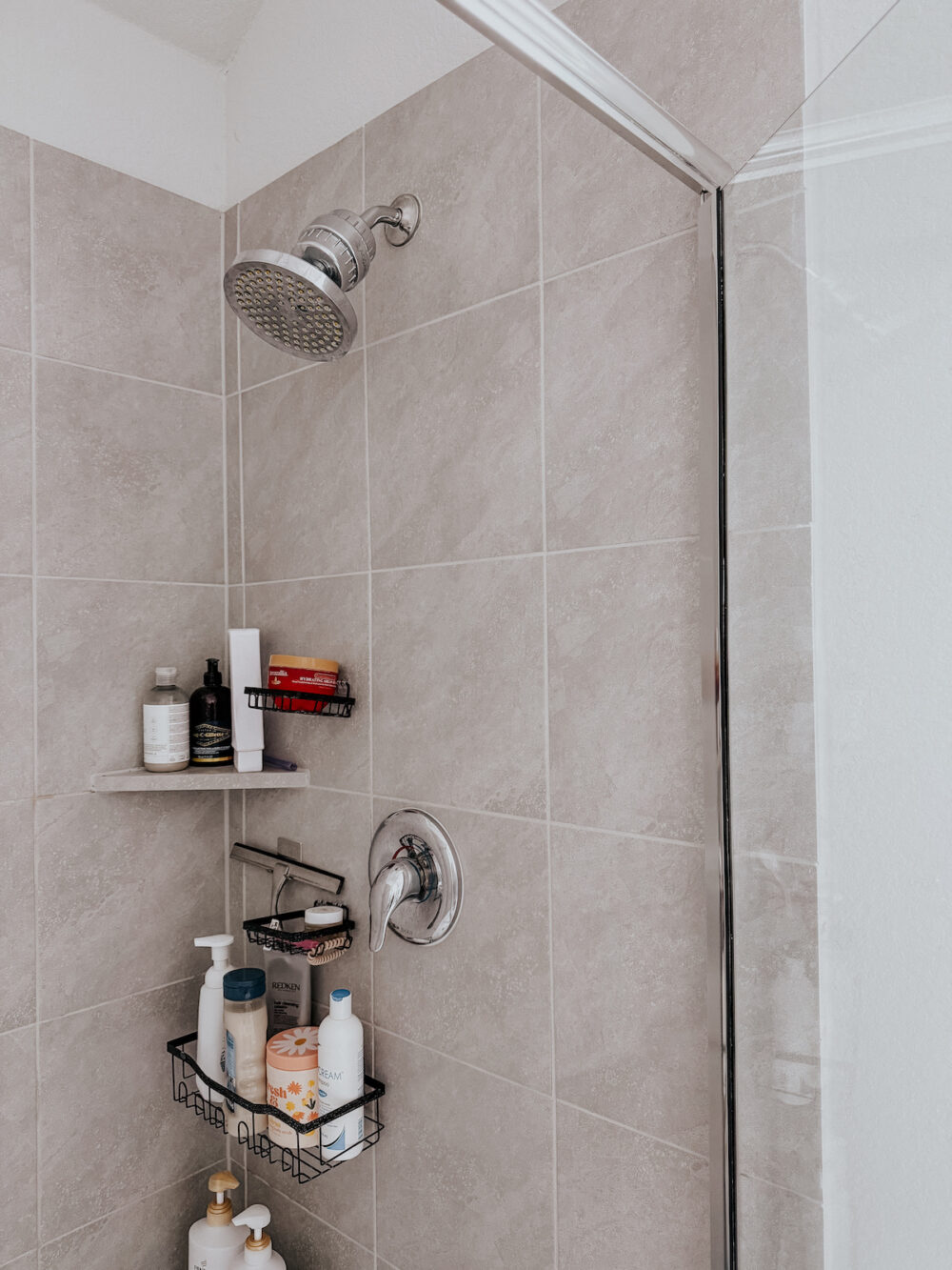 Shower with a water filter added to the shower head