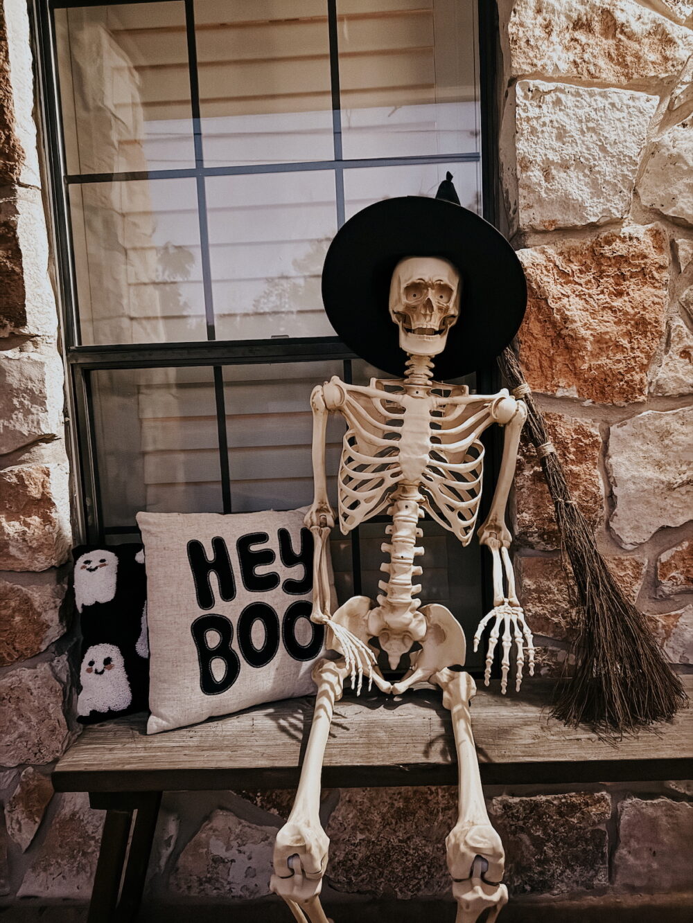 large skeleton on a front porch 