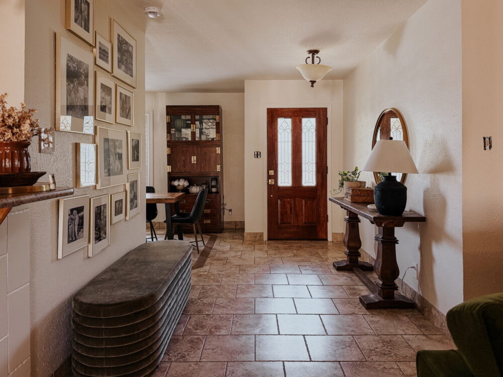 entry of a home with tile and white walls