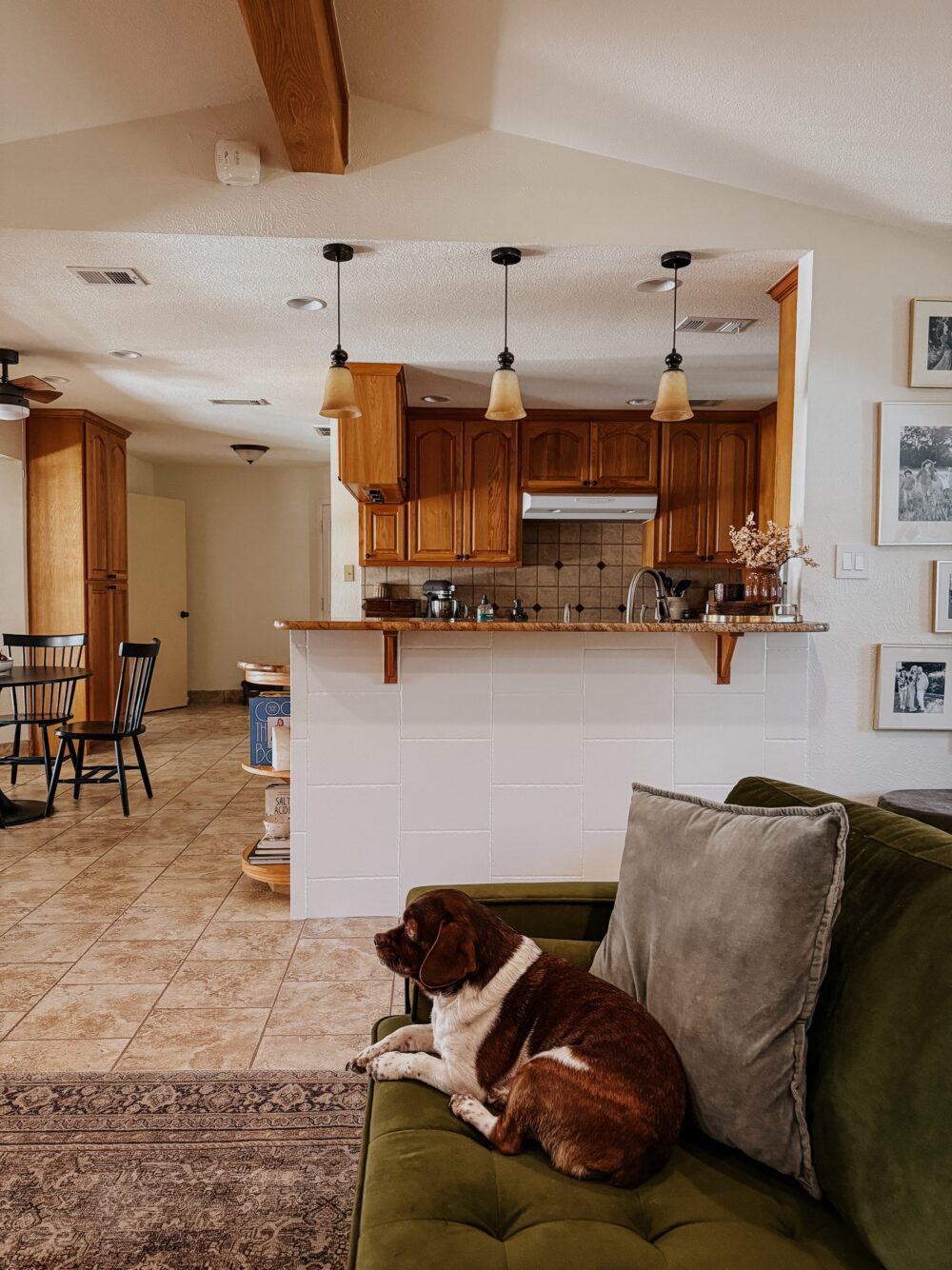 living room with painted tile wall