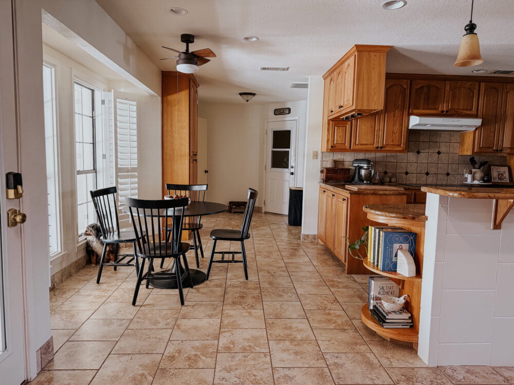 kitchen with eat-in dining area painted Timeless by Clare Paint